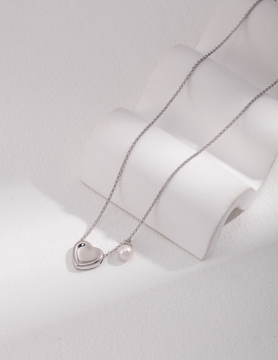 Lucky Pearl Heart Necklace: Exquisite 18k Gold Heart Accent, French-inspired Ambience, Reversible Design
